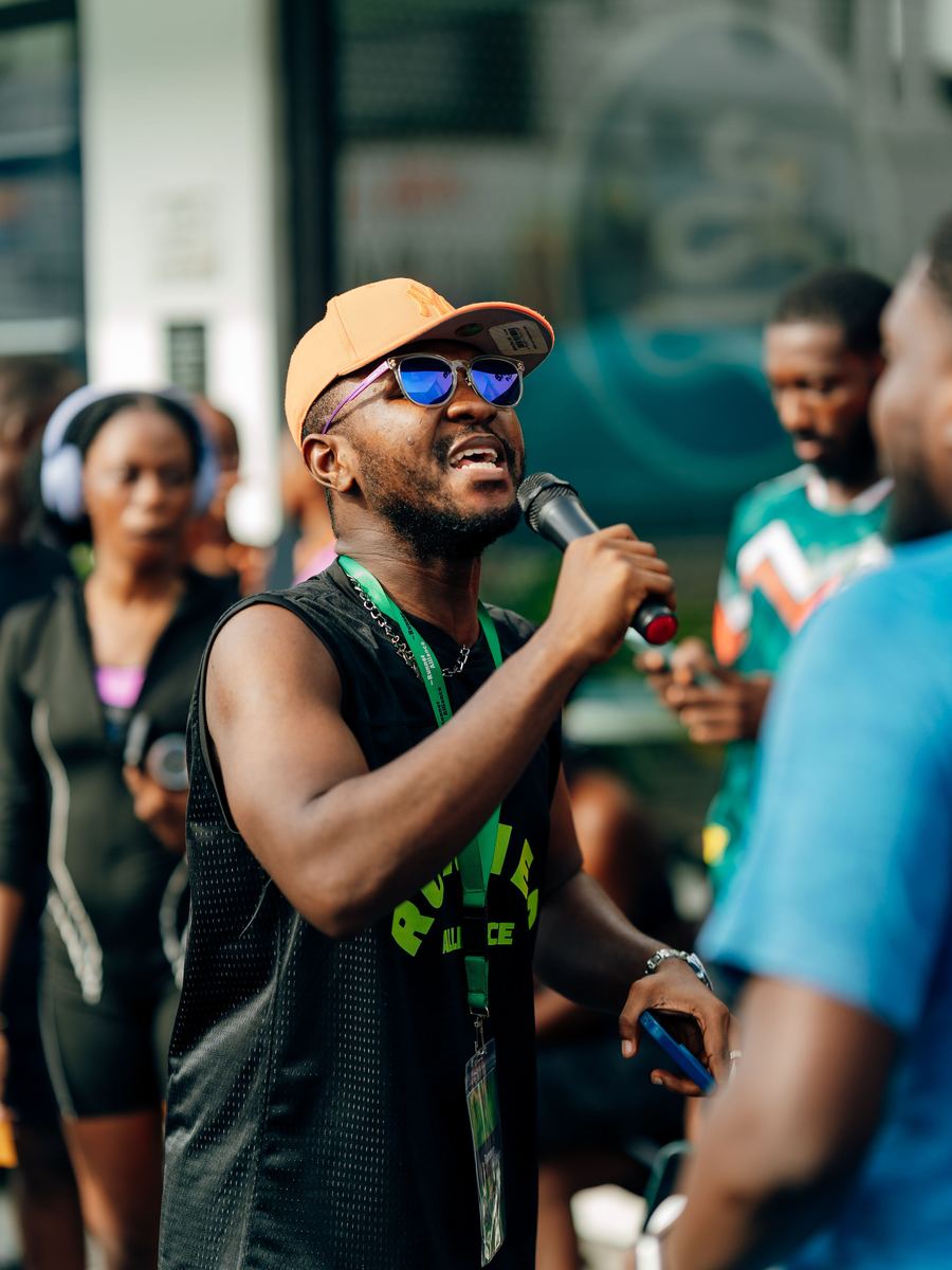 An MC on the microphone getting the field going before the gun