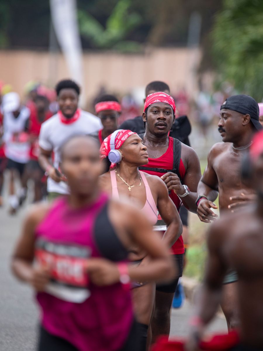 The pack, close together and mid-stride